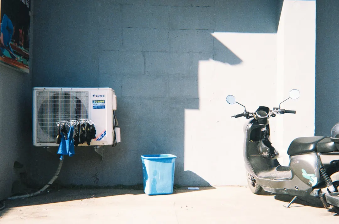 AC tune-up service on residential outdoor unit in Montreal
