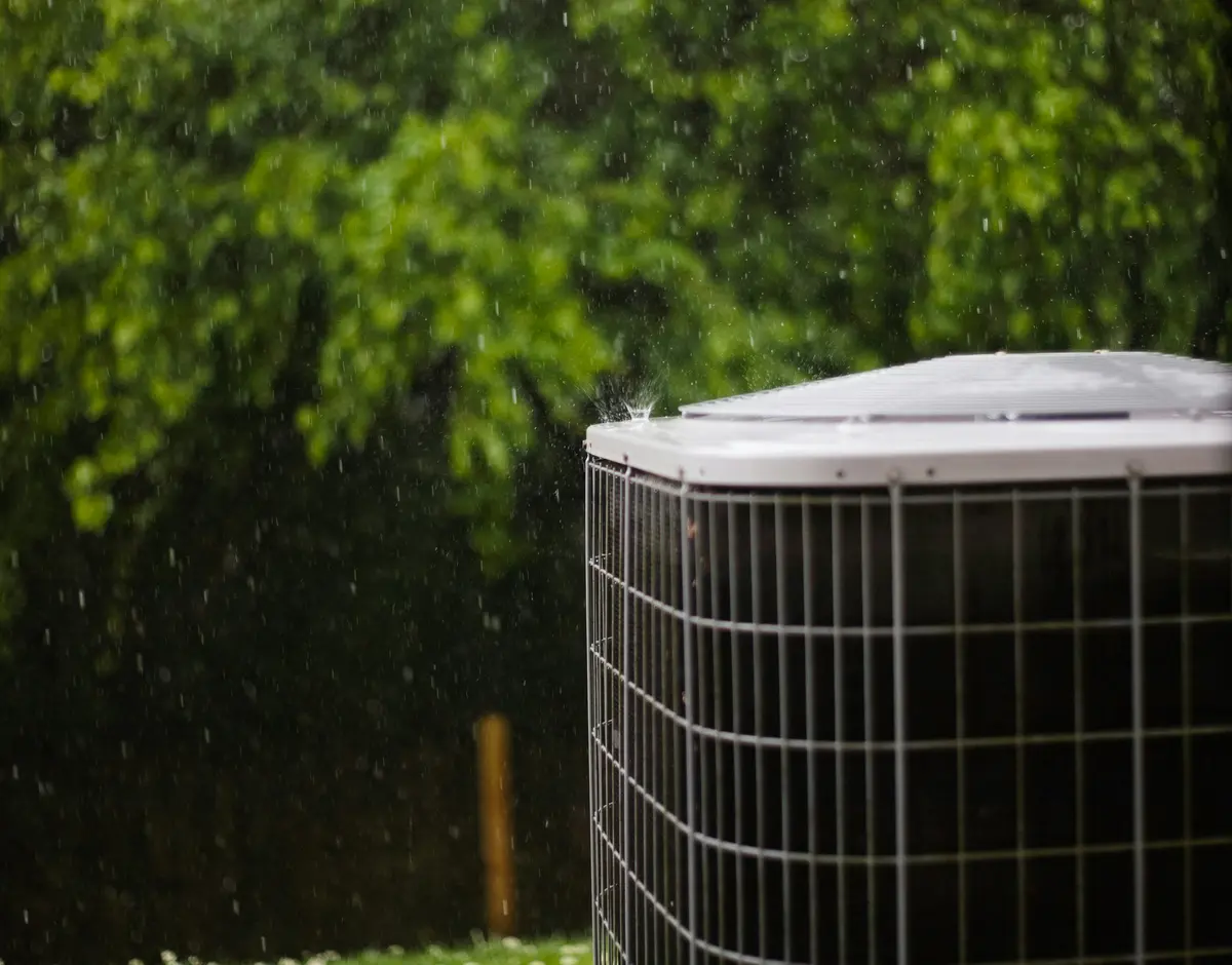 Residential outdoor AC condenser installed at a Montreal home