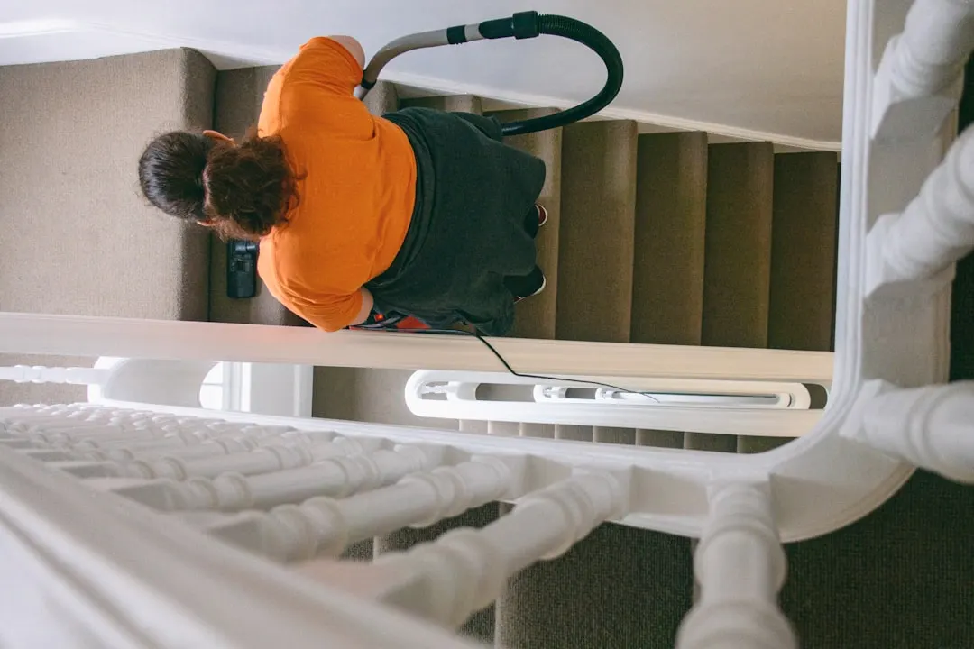 Duct cleaning technician with HEPA vacuum in Montreal