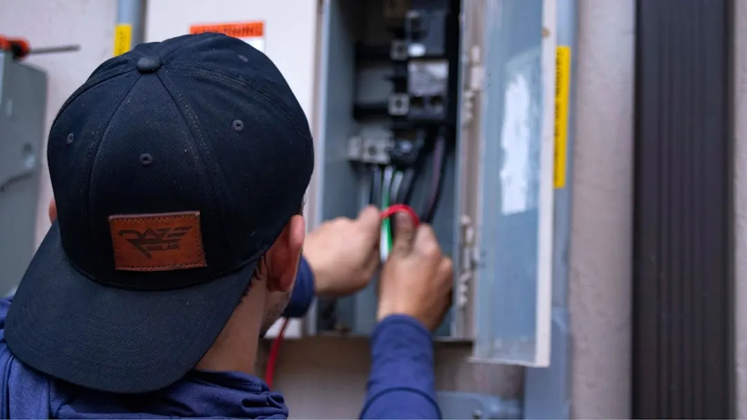 Montreal Heating and Cooling technician installing a high-efficiency furnace