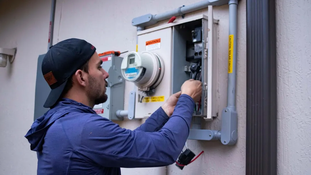 HVAC technician on a maintenance plan visit in Montreal